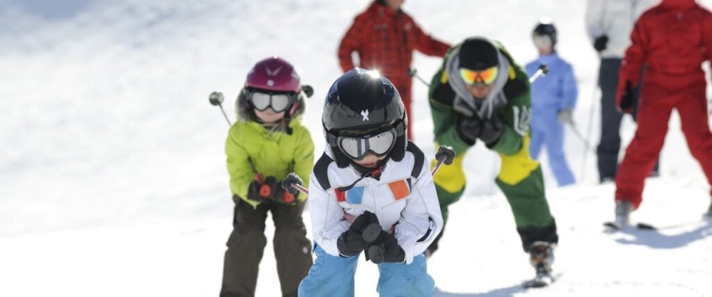 children skiing