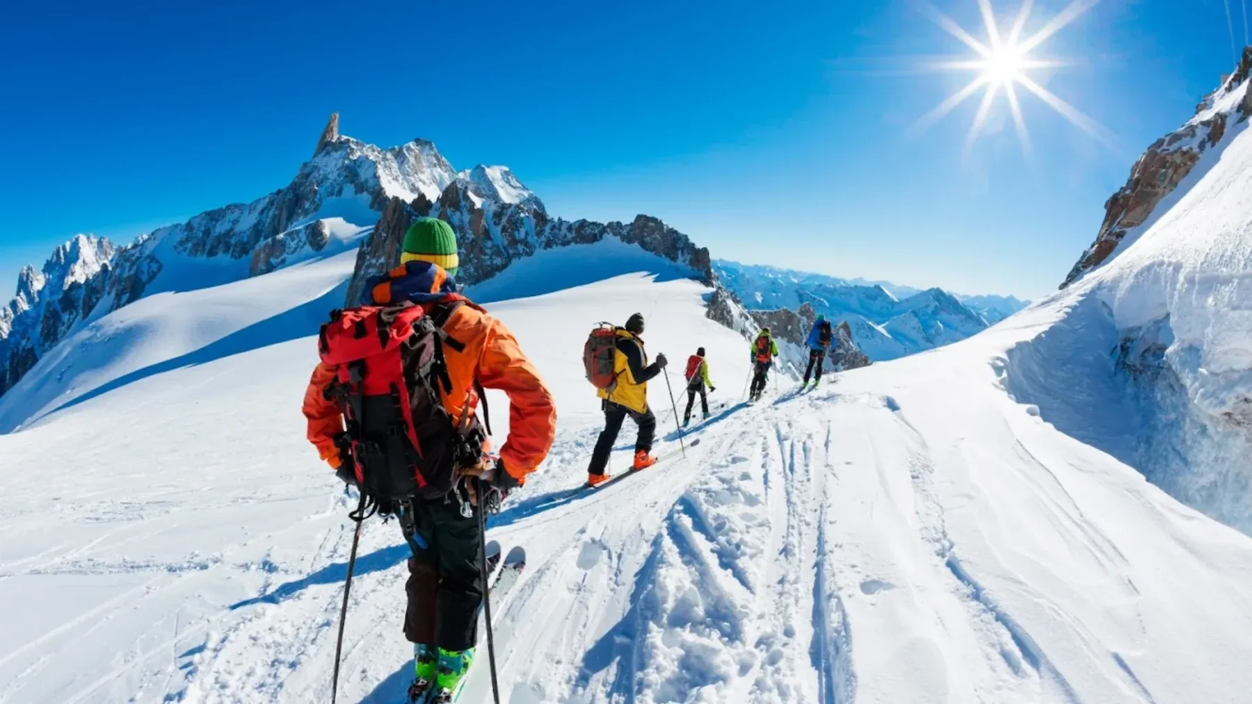 A family of skiers skiing
