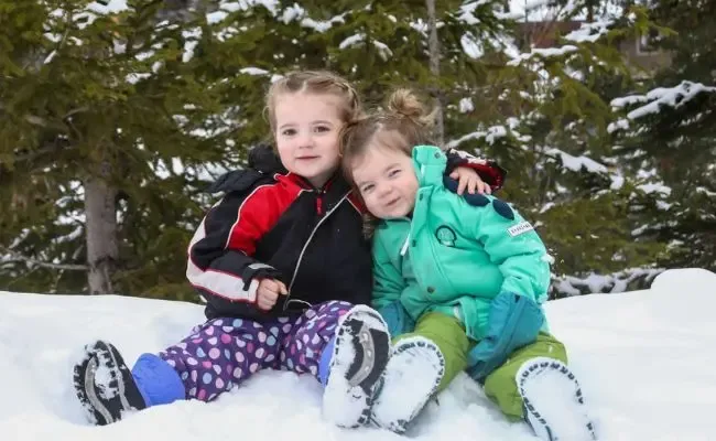 Two siblings on the slopes