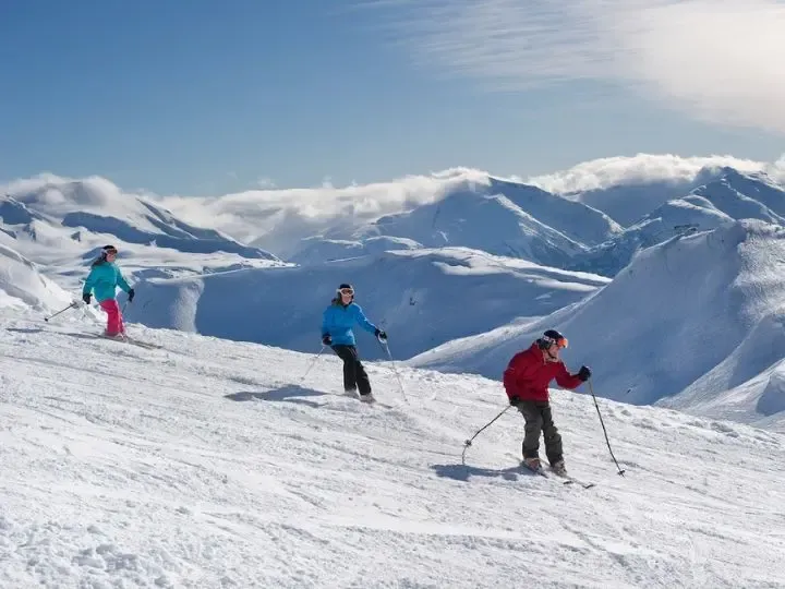 Skiing down mountain
